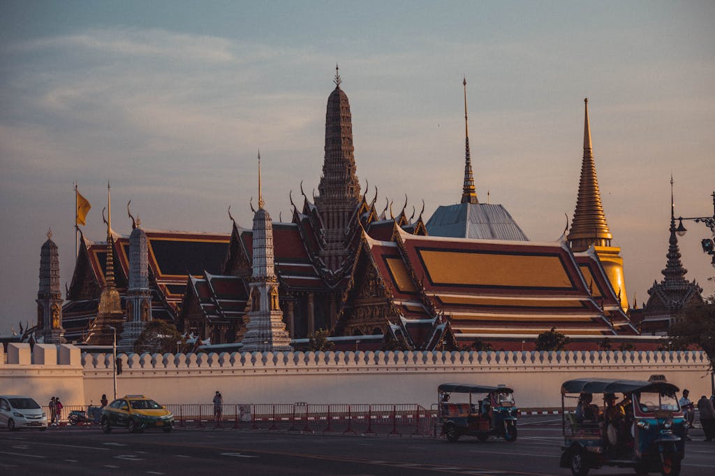 Captivating photo of Wat Phra Kaew temple in Bangkok, showcasing its intricate architecture at dusk.