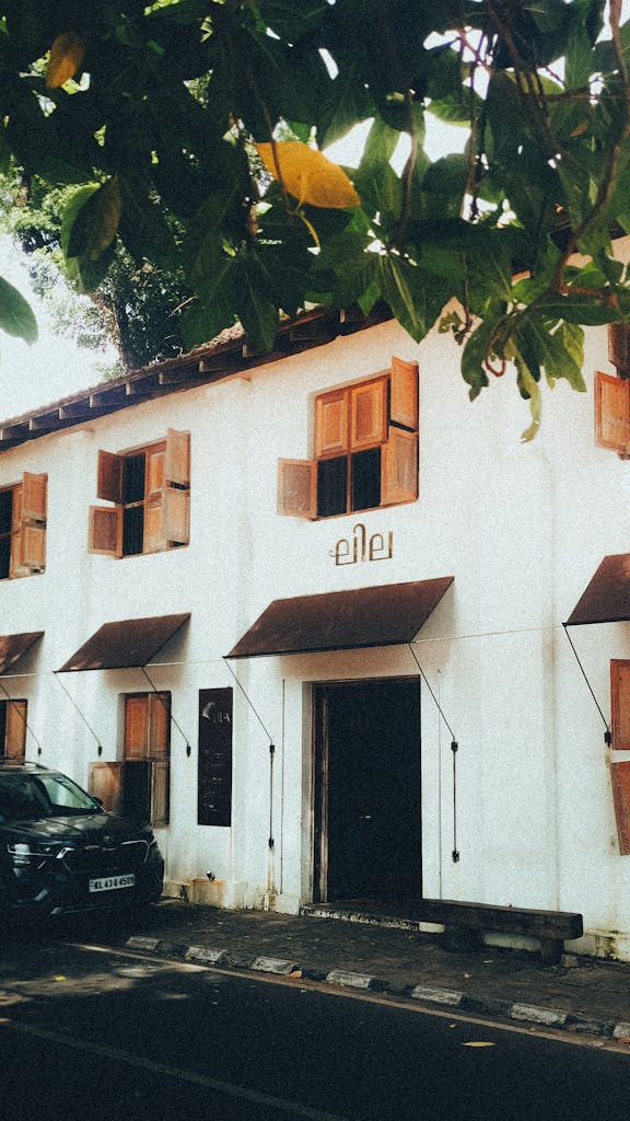 Capture of traditional Kerala architecture in Fort Kochi, showcasing moody aesthetics and local charm.