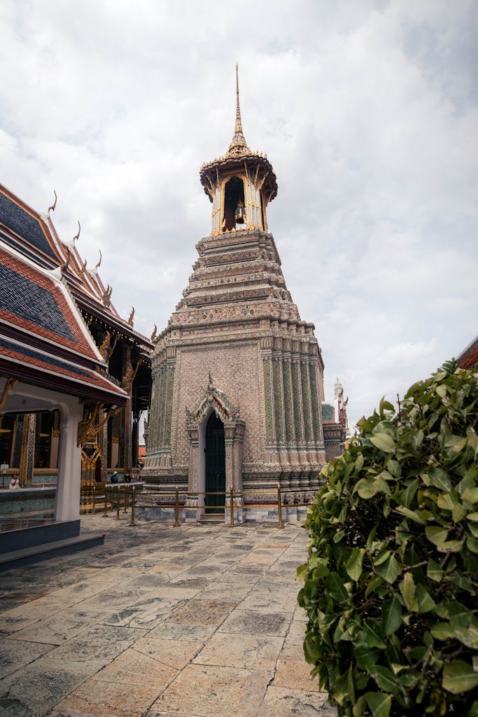 Detailed view of the ornate spire at Wat Phra Kaew in Bangkok, capturing the temple's intricate architecture.