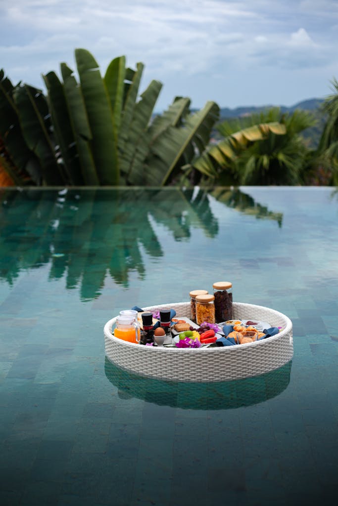 Indulge in a luxurious floating breakfast in an exotic Thai pool setting.