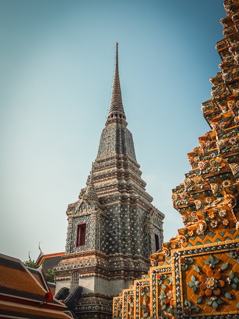 Stunning view of a traditional Thai temple spire in Bangkok, capturing cultural heritage and architectural beauty.